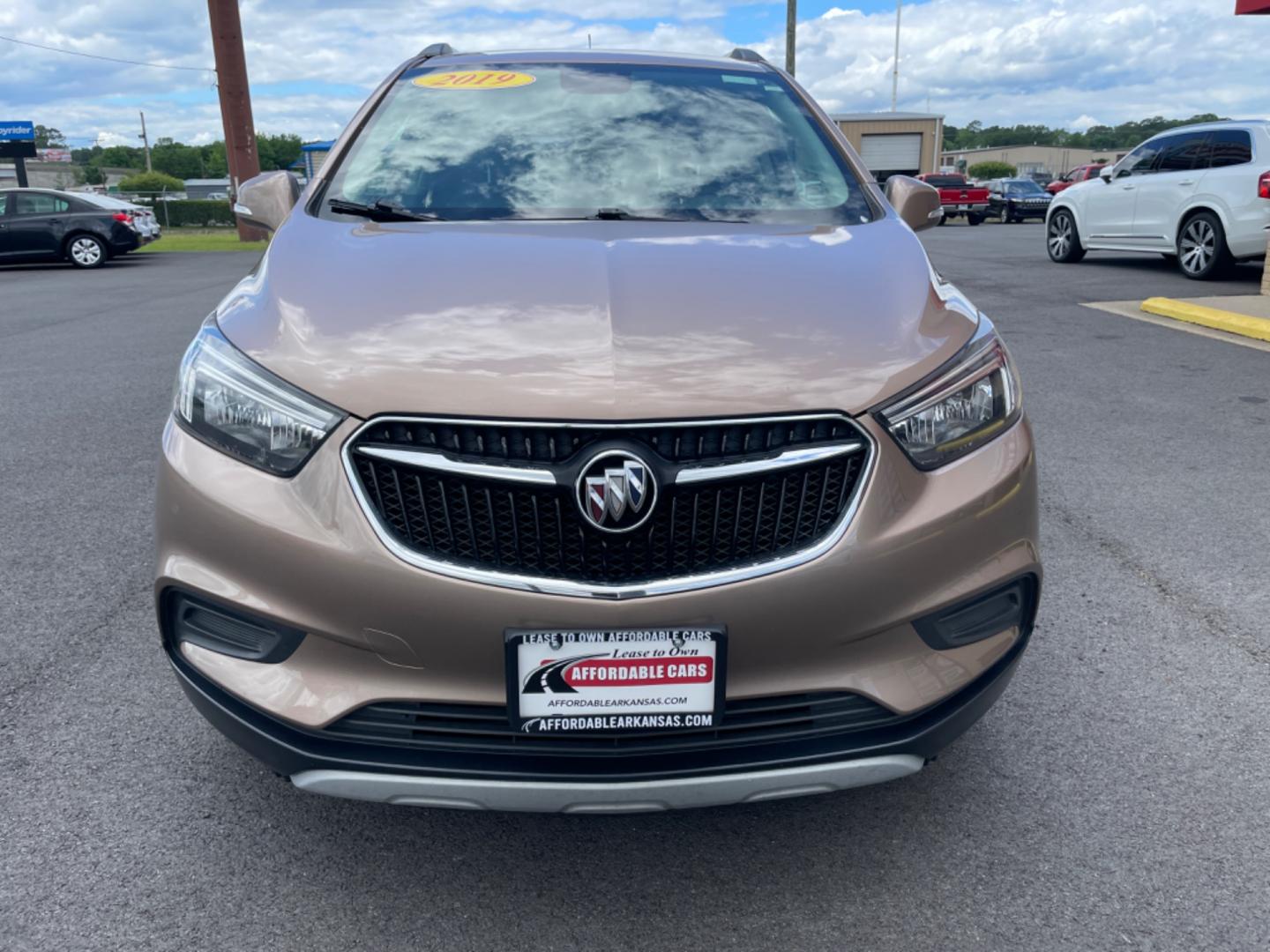 2019 Brown Buick Encore (KL4CJASB6KB) with an 4-Cyl, ECOTEC, Turbo, 1.4 Liter engine, Automatic, 6-Spd w/Overdrive and Shift Control transmission, located at 8008 Warden Rd, Sherwood, AR, 72120, (501) 801-6100, 34.830078, -92.186684 - Photo#2